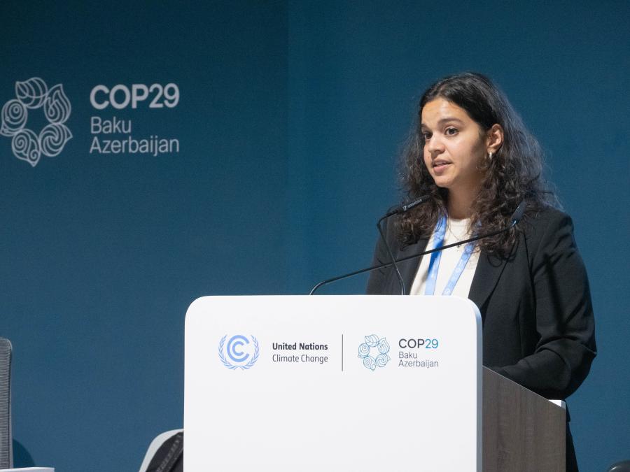 Aayushi Singh speaking at a UNFCCC side event at COP29 in Baku