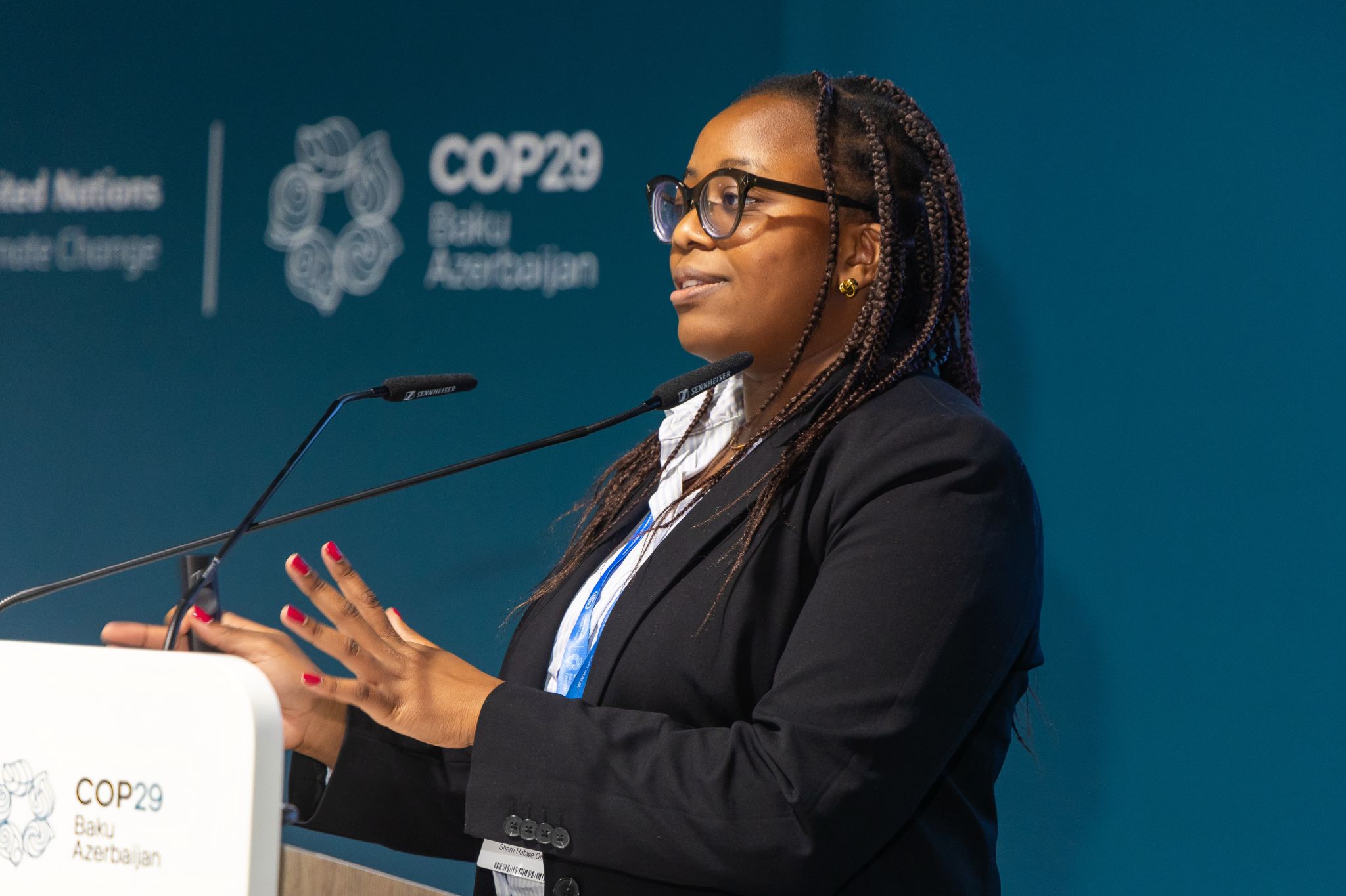 Sherri Ombuya speaking at a COP29 side event in Baku